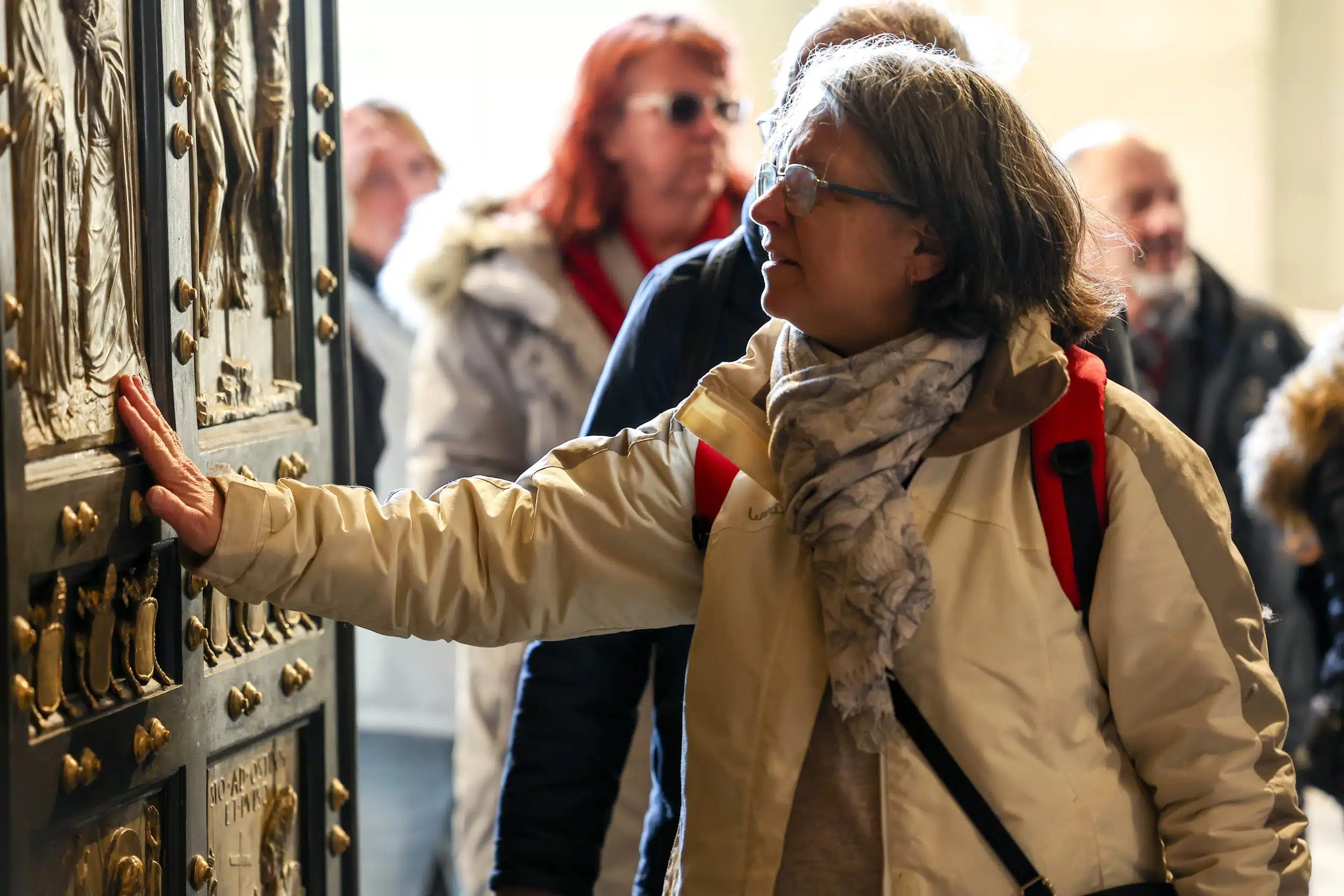 Pope opens Holy Door of St. Peter's Basilica, launching 'Jubilee of